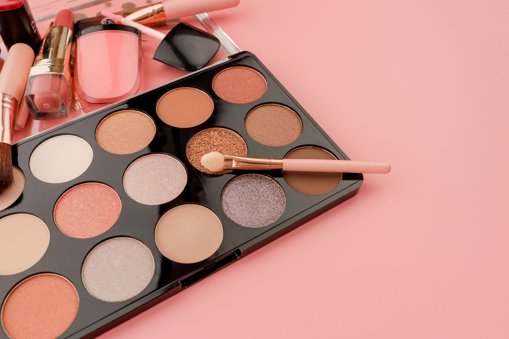 various-makeup-productson-pink-background-with-copyspace